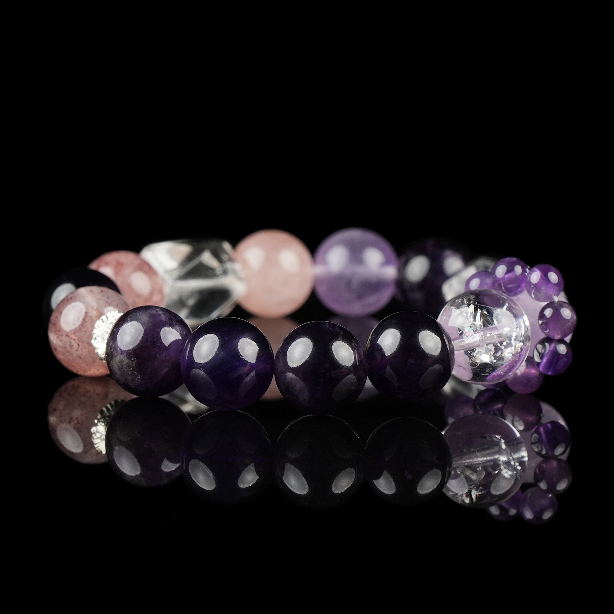 Amethyst and Rose Quartz Crystal Bracelet with Faceted Clear Quartz Center – Healing Gemstone Jewelry with Purple Energy Beads on Black Background.