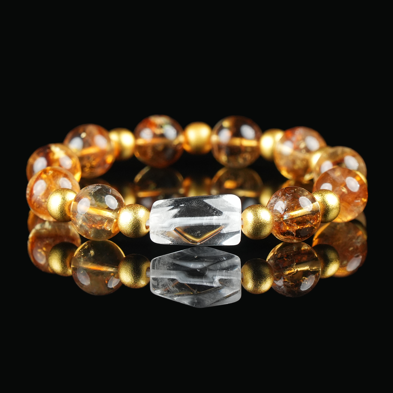 Citrine crystal bracelet with transparent golden beads and gold accents, designed to attract wealth, joy, and positive energy.