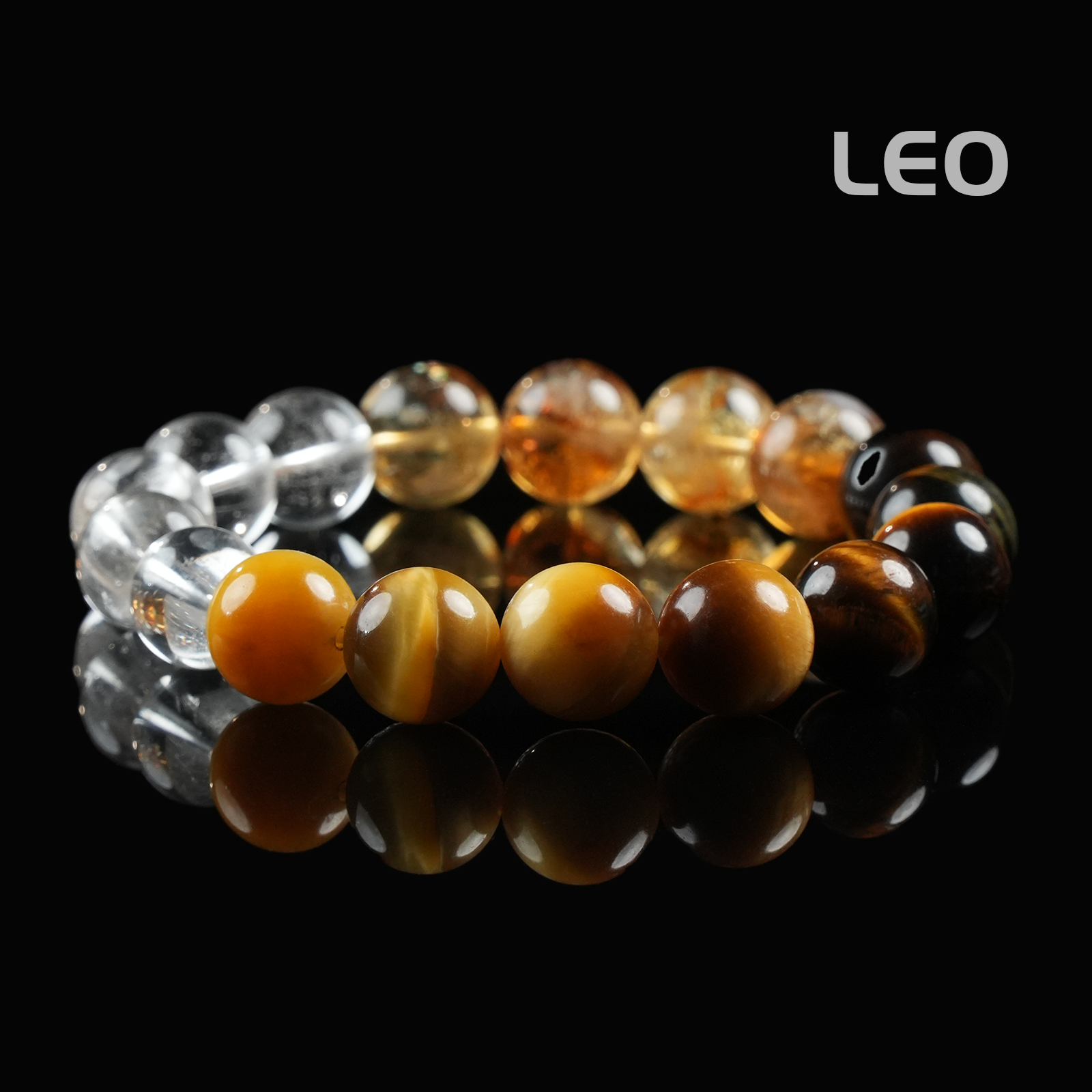 Leo zodiac crystal bracelet with yellow citrine, brown tiger eye, and clear quartz – gemstone bracelet for vitality and courage.