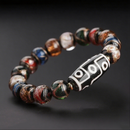 Tibetan Nine-Eyed Dzi Bead Bracelet – Handcrafted Spiritual Jewelry