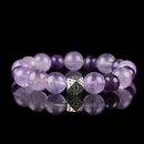 Amethyst Crystal Healing Bracelet with Silver Geometric Charm – Calming Spiritual Energy Stone Jewelry on Black Background.