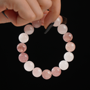 This delicate gemstone bracelet is composed of soft pink Rose Quartz and sparkling Strawberry Quartz beads. The combination exudes gentle feminine energy and emotional healing, perfect for daily wear or gifting.