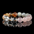 A gemstone bracelet made with Strawberry Quartz, Clear Quartz, Citrine, and Grey Moonstone, designed for love, clarity, and vitality.