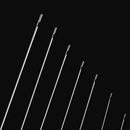 A diagonal view of multiple beading needles arranged side by side, showcasing their consistent length and fine tips—ideal for precise beadwork.