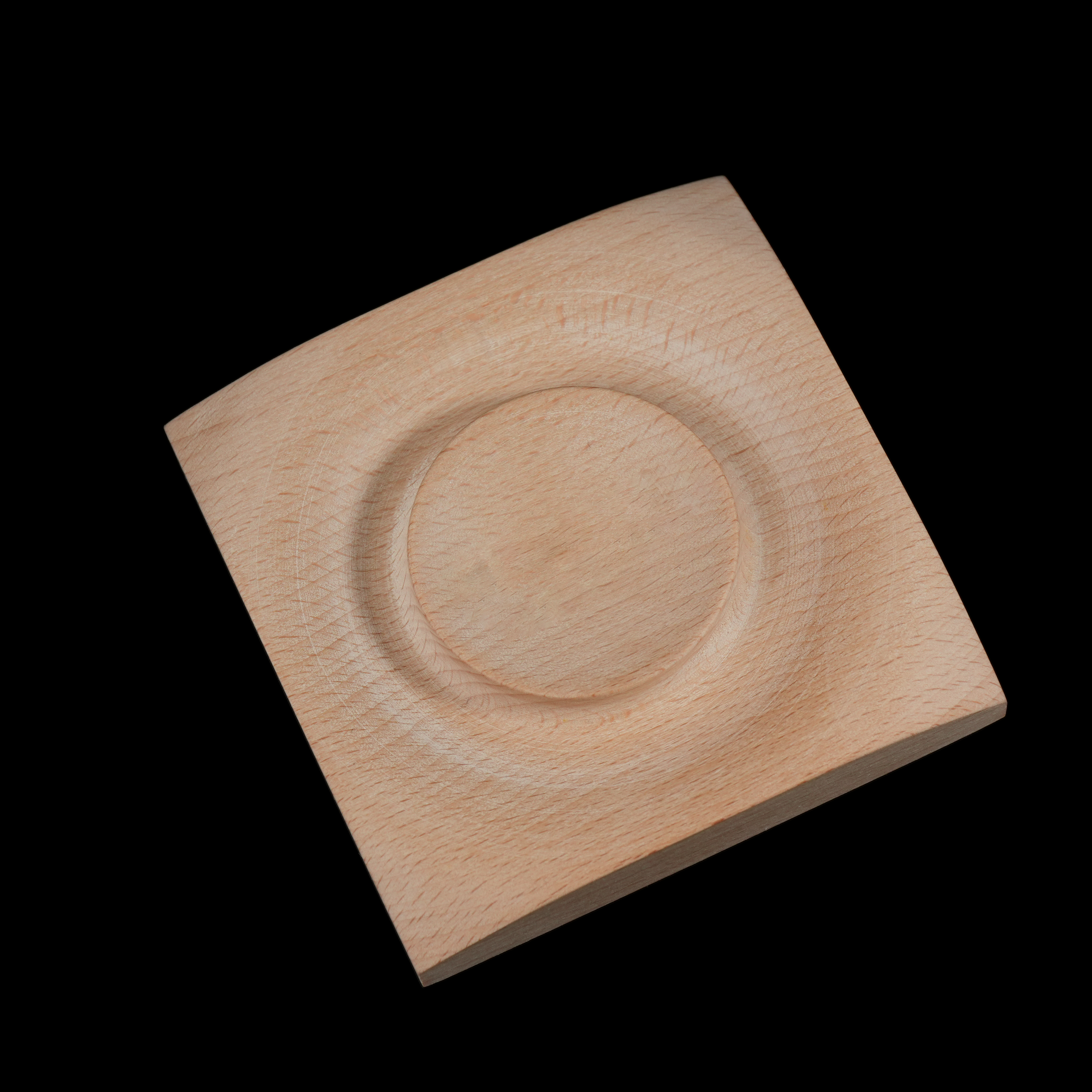 A view of the underside or reverse side of the tray, showing the same circular indentation but without any text engraving—emphasizing its customizable nature.