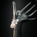 Libra astrology bracelet displayed on a mannequin hand, featuring calming blue chalcedony and clear quartz for emotional balance and harmony.