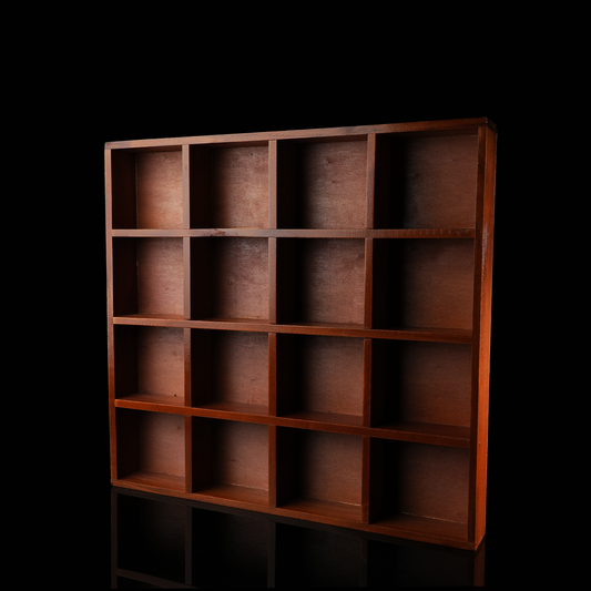 This image shows a large square wooden organizer box with 16 equally sized compartments. The box is positioned upright against a black background, highlighting the warm wood grain and symmetrical grid layout.